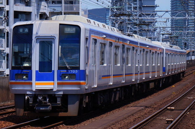 住ノ江検車区1000系1033Fを萩ノ茶屋駅で撮影した写真