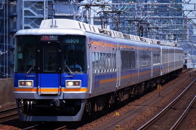 住ノ江検車区10000系10509Fを萩ノ茶屋駅で撮影した写真