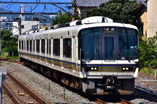 吹田総合車両所奈良支所221系NA419編成を木幡駅で撮影した写真