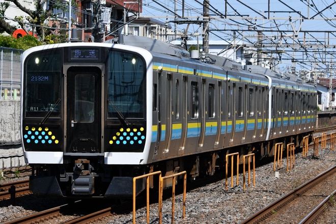幕張車両センターE131系マリR11編成を新検見川駅で撮影した写真