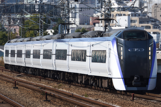 松本車両センターE353系を西荻窪駅で撮影した写真